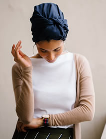 Person looking at their wrist watch.